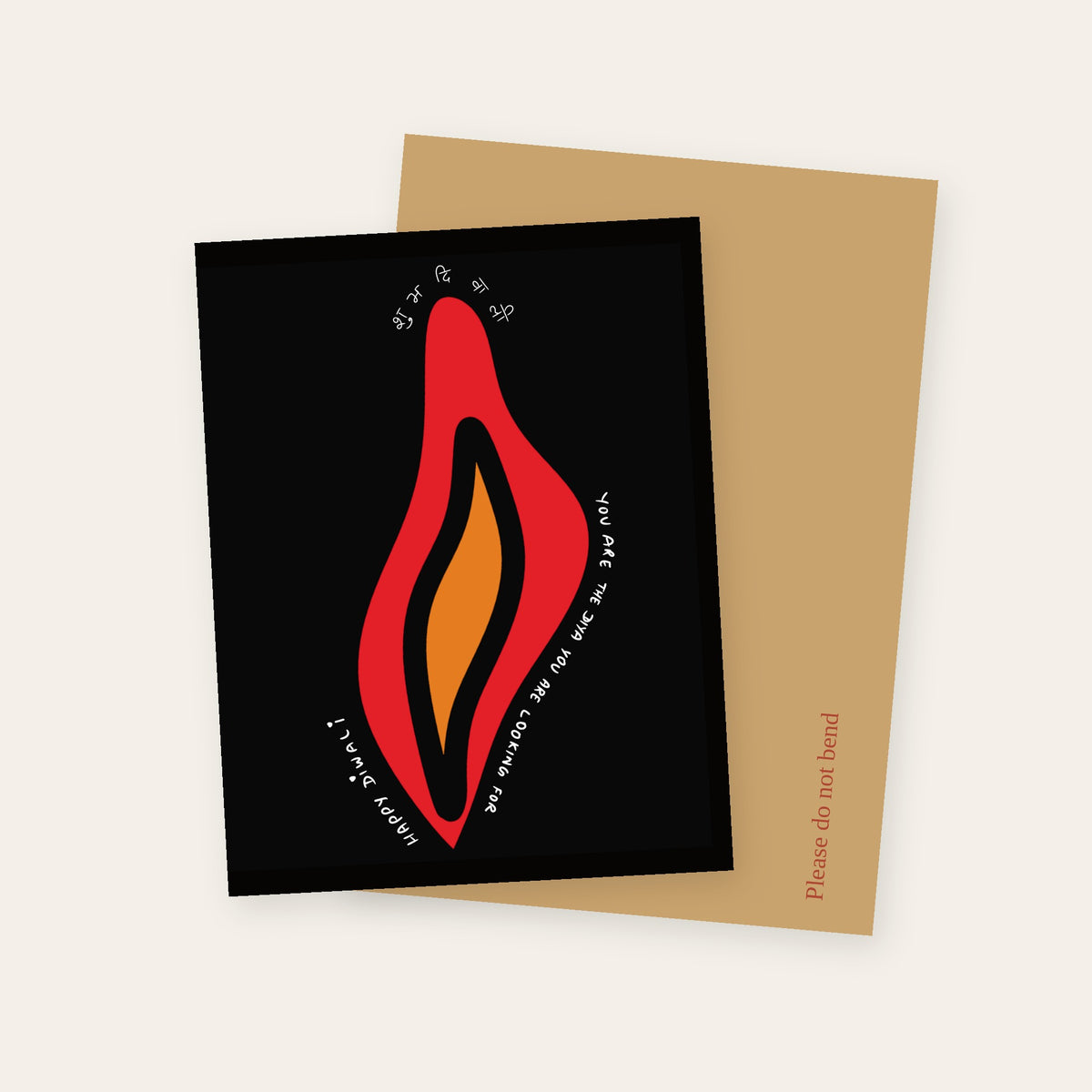 Shubh Diwali greeting card with a red and orange flame on black and the words You are the diya you are looking for, with its kraft mailer.