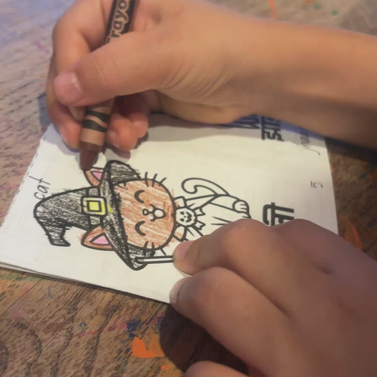 Coloring the witch cat page of Words of Halloween