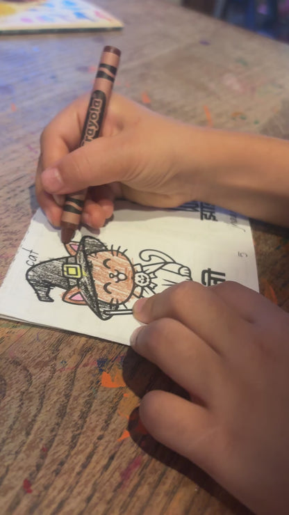 Coloring the witch cat page of Words of Halloween