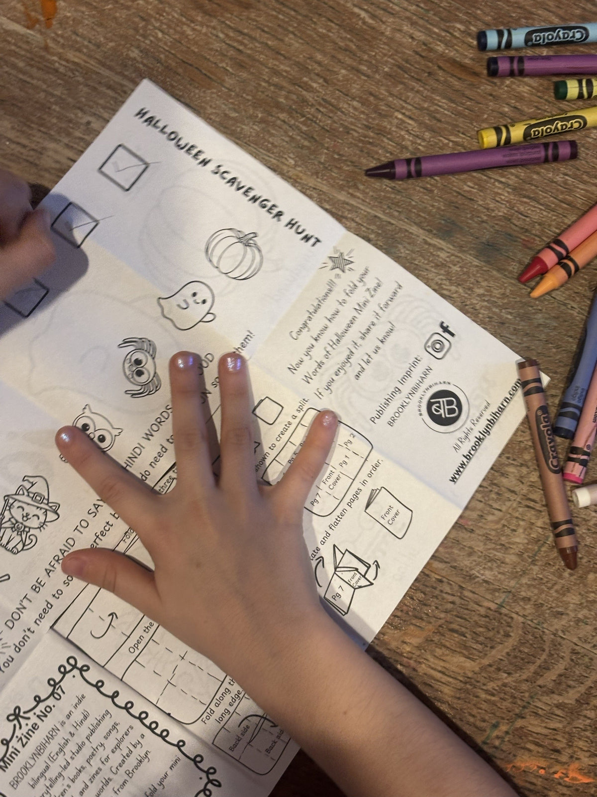 Halloween scavenger hunt page and folding instructions